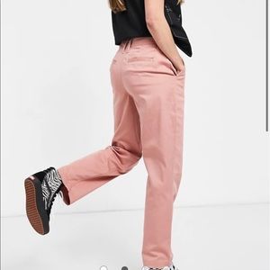Woman’s Vans pink authentic chino pants.